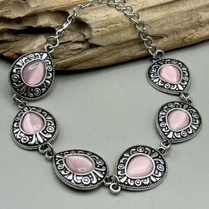 Elegant Silver and Pink Bracelet